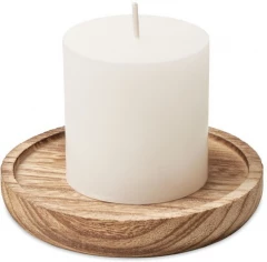 Candle on round wooden base